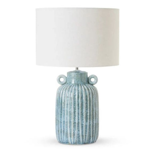 Bleue table lamp with ceramic base, textured with a subtle leaf pattern. Linen blend shade.