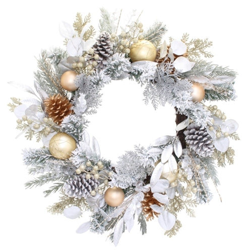 CHristmas wreath with silver and gold accents, baubles and pine cones on green foliage.