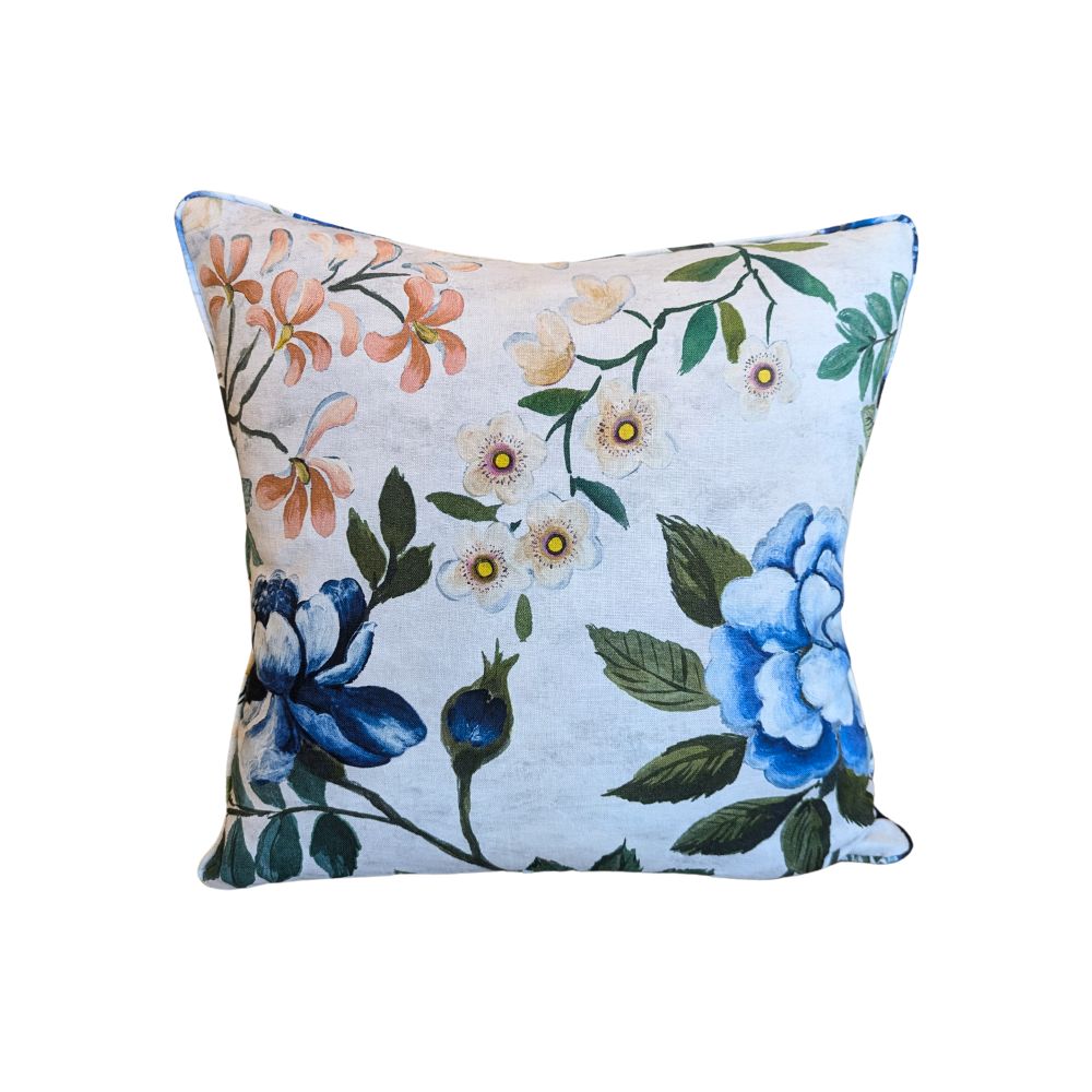 Designers Guild Porcelaine De Chine Cushion, floral with birds and butterflies on a grey background.